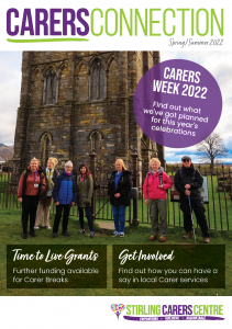 Front Cover of our Carers Connection Spring/Summer 2022 magazine showing a group a Carers from the walking group standing in front of Cambuskenneth Abbey.