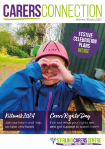 Front cover of Carers Connection magazine featuring image of a young girl in climbing kit and helmet making a heart shape with her fingers.