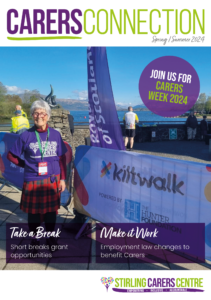 Front cover of Carers Connection magazine featuring image of an older lady wearing a Stirling Carers Centre t-shirt and standing in front of a Kiltwalk banner.